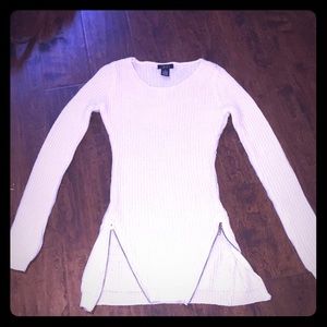 A cotton and acrylic long sleeve dress sweater